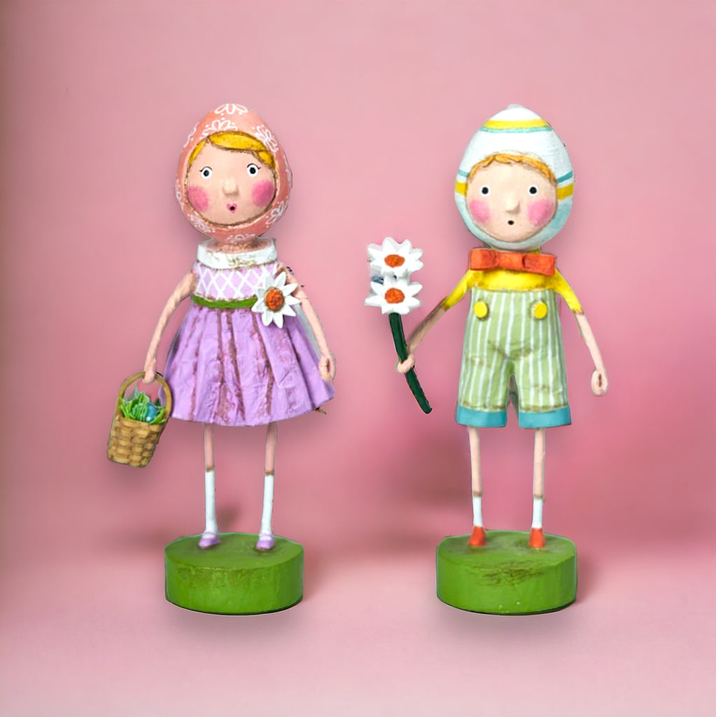 Meet Shelly and Shelldon, Lori Mitchell's newest Easter couple! Their adventure starts in 2024 with hand painted details and folk art styling to make this Easter pair truly one-of-a-kind. Put them together and you've got a hare-raising good time!