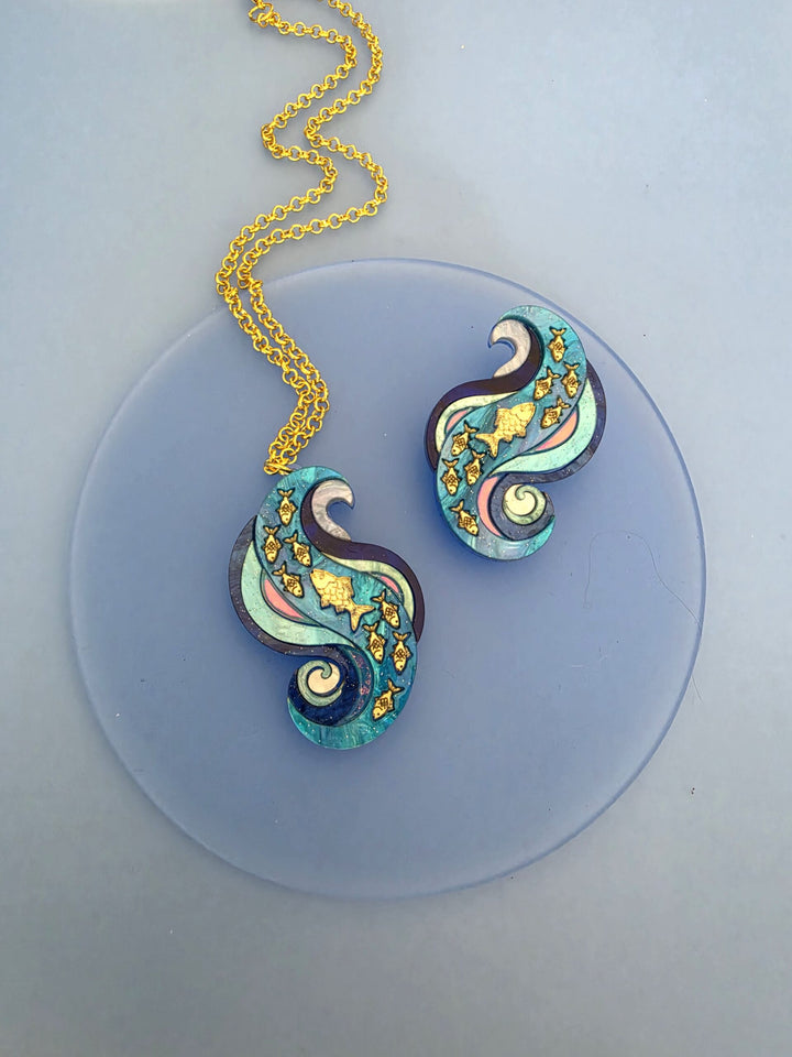 Swimming Against the Current Shoal of Fish Pin or Pendant