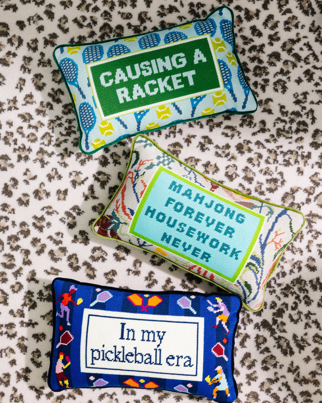 Causing A Racket Needlepoint Pillow