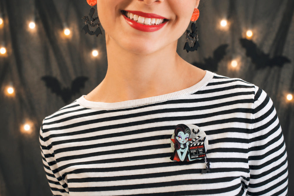Vampire clapperboard brooch detail — layered acrylic Halloween cinema jewelry — LaliBlue Midnight Cinema