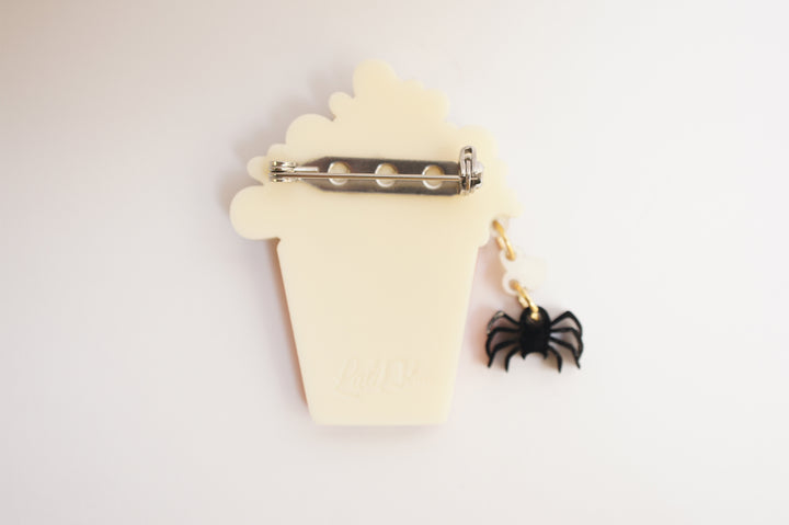Layered acrylic Halloween popcorn brooch set worn — spooky cinema snack jewelry — LaliBlue Midnight Cinema