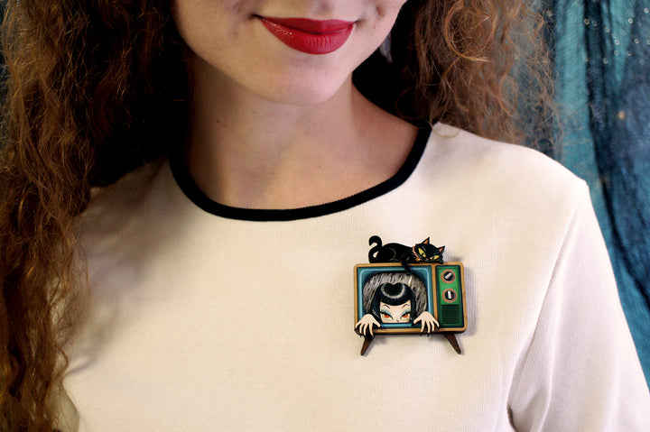Night TV ghost girl and black cat brooch close-up — Halloween acrylic scene jewelry — LaliBlue Midnight Cinema