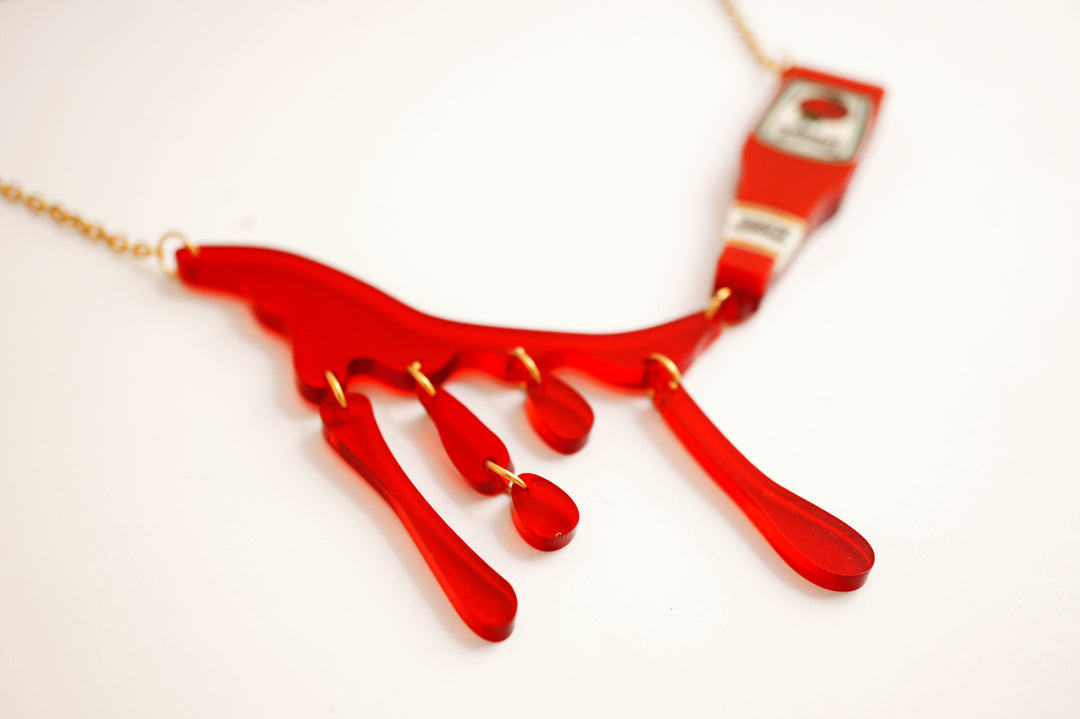 Ketchup blood cascade necklace worn — horror movie acrylic illustrated wood jewelry — LaliBlue Midnight Cinema
