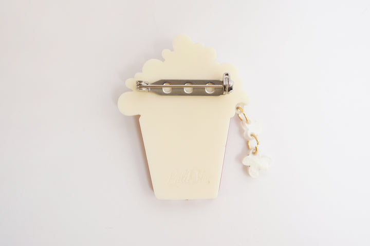 Popcorn brooch set of 2 close-up — Halloween cinema snack layered acrylic jewelry — LaliBlue Midnight Cinema