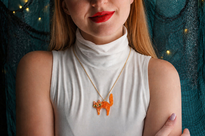 Scared Halloween black cat necklace side view — layered acrylic illustrated wood jewelry — LaliBlue Midnight Cinema