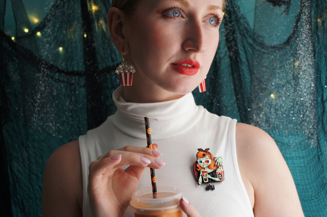 Zombie girl brooch detail — cinema viewer with popcorn and spider — Halloween acrylic glitter jewelry — LaliBlue Midnight Cinema
