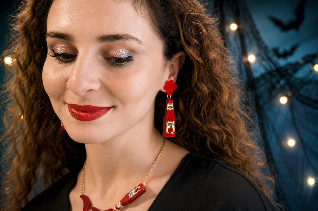 Ketchup blood bottle earrings detail — horror movie novelty acrylic jewelry — LaliBlue Midnight Cinema