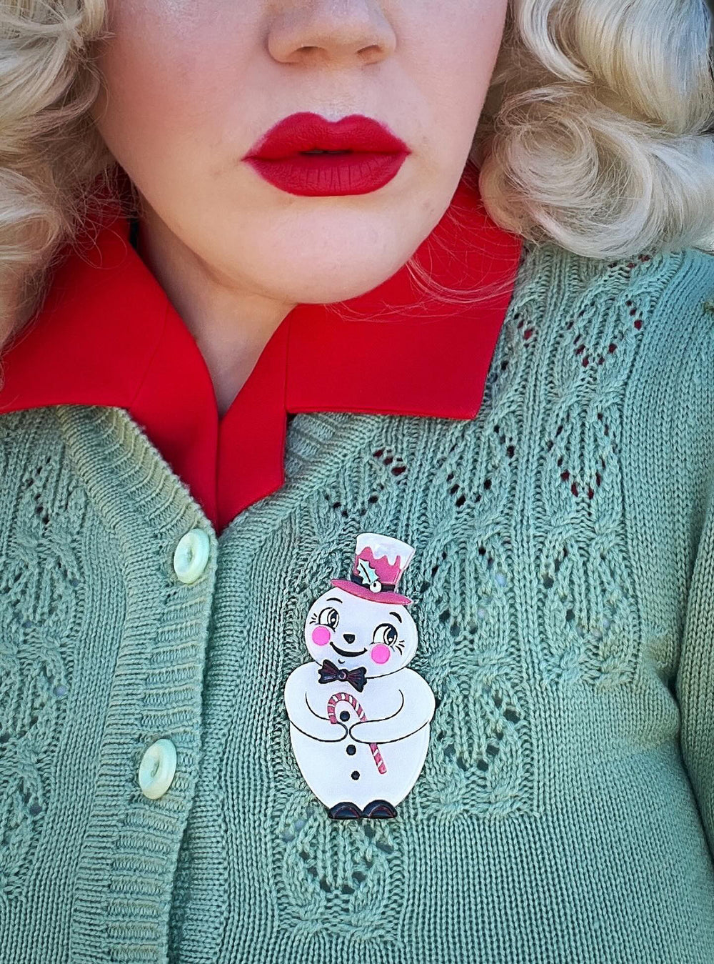 Johanna Parker x Lipstick & Chrome snowman brooch styled on coat — Love at Frost Sight