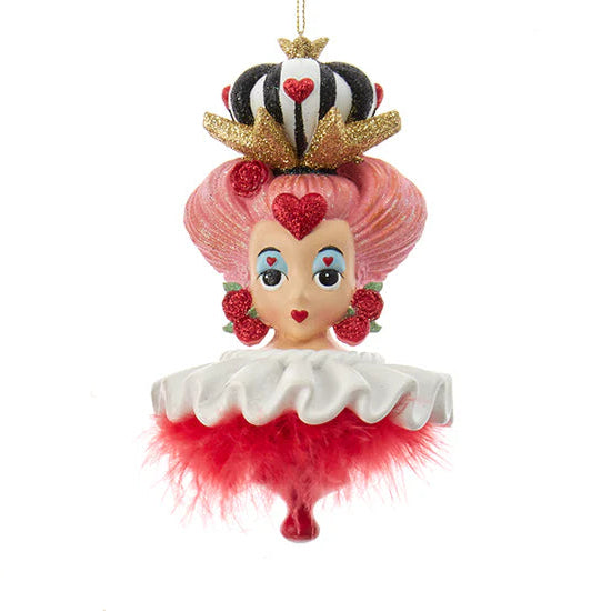 Set of decorative ornaments inspired by characters from a fantasy or fairy tale, featuring colorful outfits and accessories.