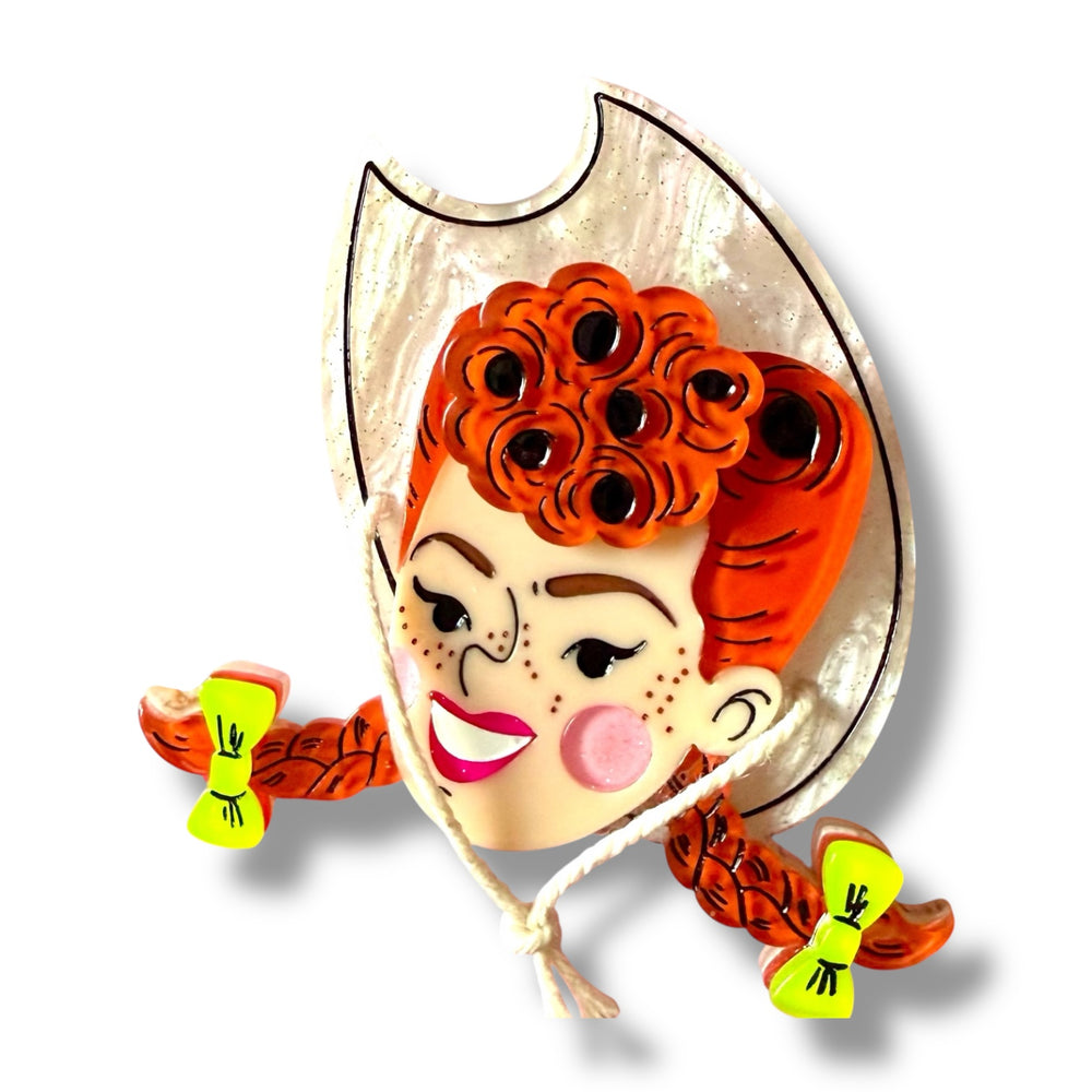 Darla the Cowgirl brooch by Marla VonDuta x Lipstick & Chrome — red braids, tipped cowgirl hat