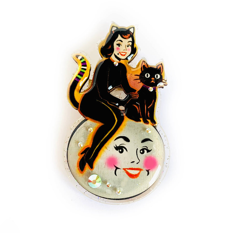 Pin with a design of a woman and a black cat brooch 