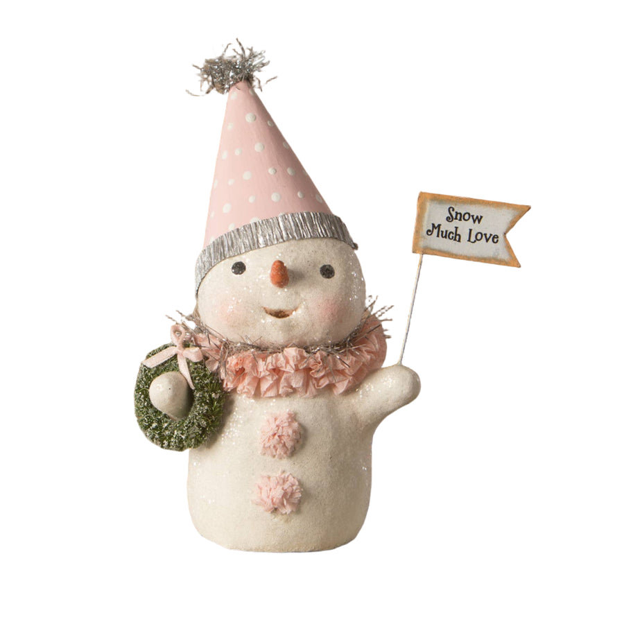Decorative snowman figurine with a pink hat and wreath by Bethany Lowe