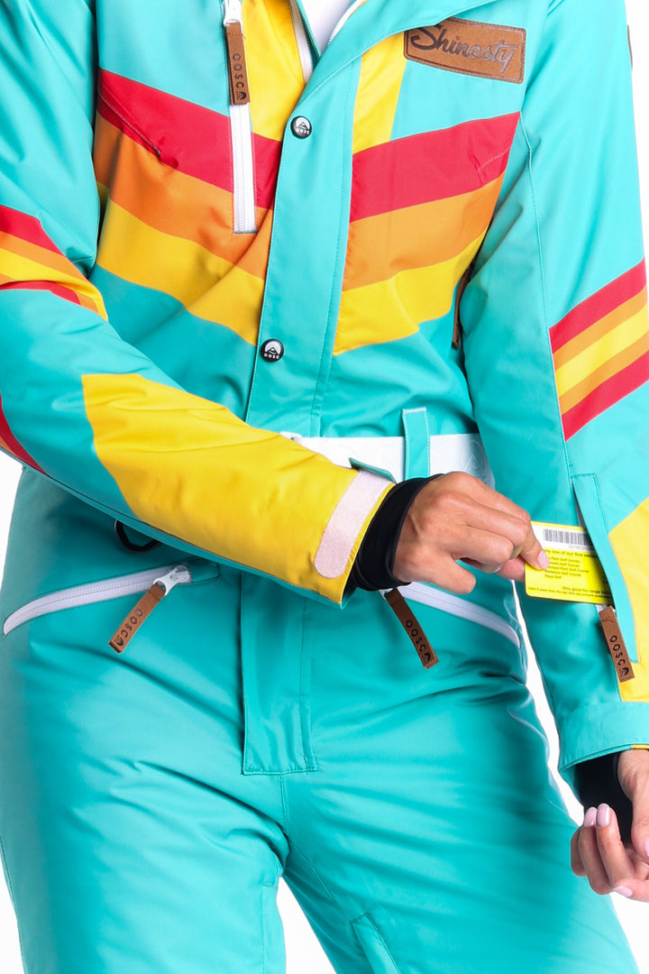 The Side Country Sender | Turquoise Striped Retro Women's One Piece Ski Suit