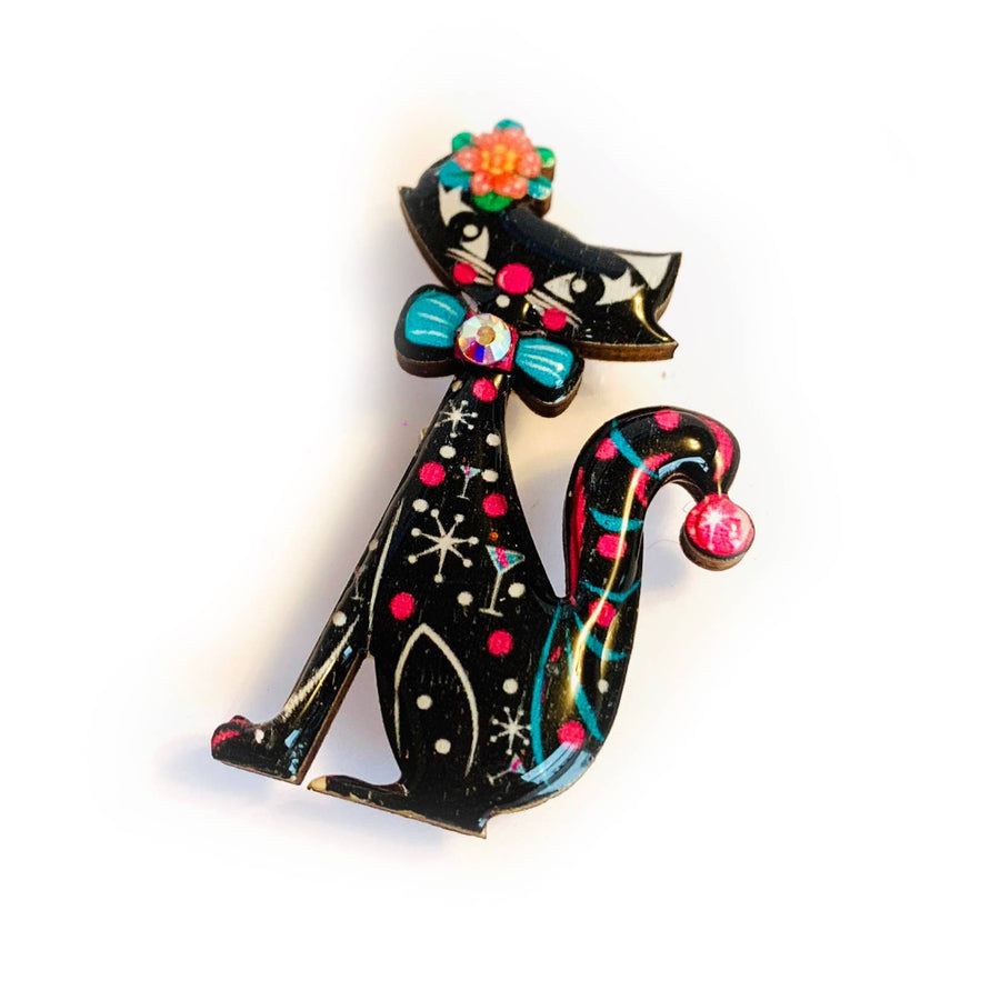 Decorative cat brooch with colorful bow and flowers 