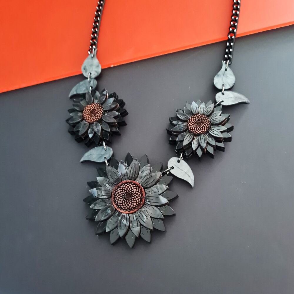 Black Sunflower Charm Necklace by Cherryloco Jewellery 