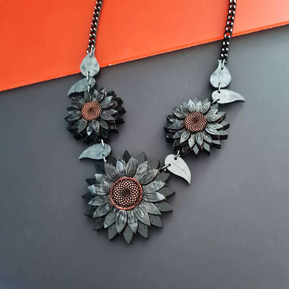 Black Sunflower Charm Necklace by Cherryloco Jewellery 
