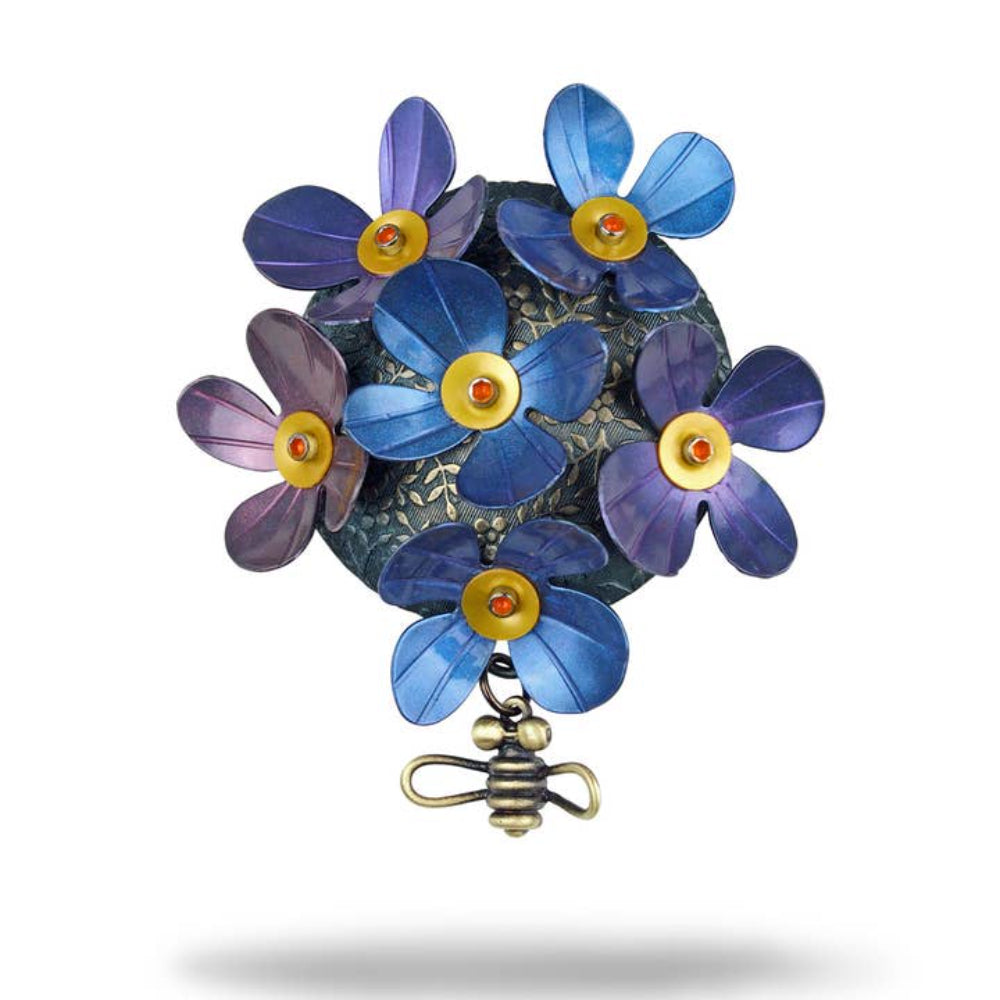 Chickenscratch Bloom Brooch Pendant — handmade oxidized brass violet blue pink mica flower brooch with orange gold center and cast brass bee dangle, convertible pin and pendant