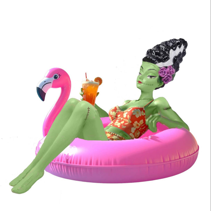 Animated character with green skin and black hair sitting on a pink flamingo pool float.