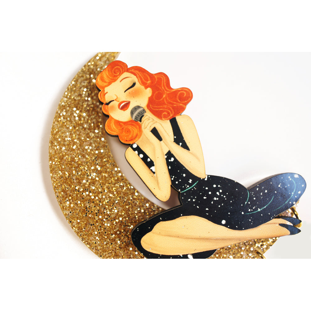 Singer sitting on the Moon Brooch by Laliblue 1