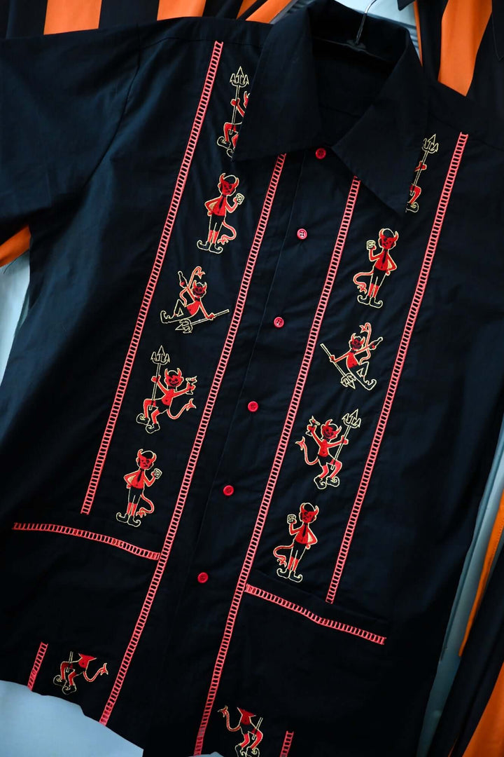Black shirt with red embroidery of devils