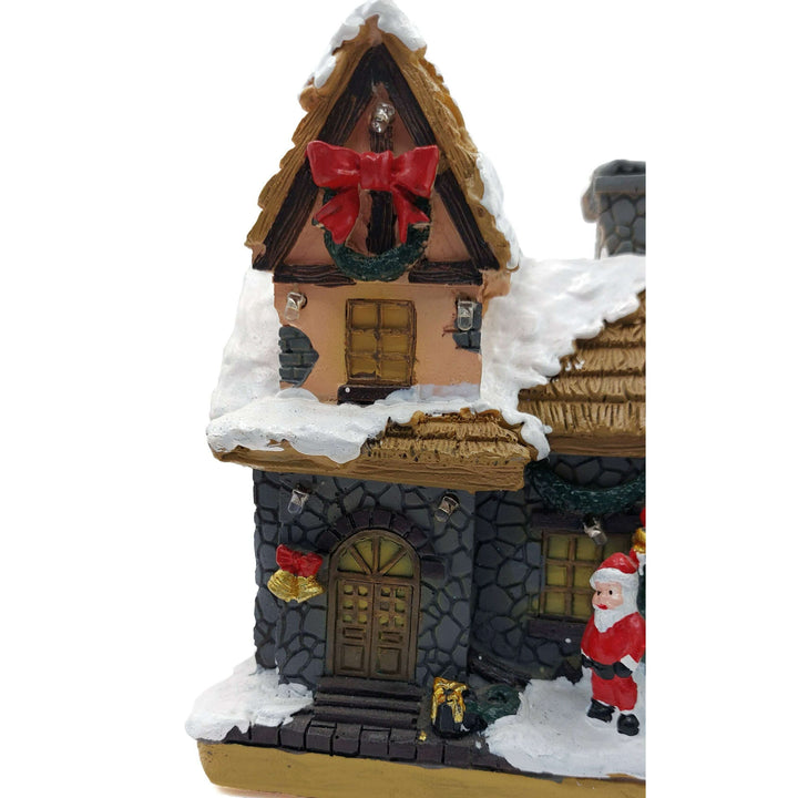 Festive Cottage with Santa Claus. Christmas Village Wizardi F07-N1-11-601
