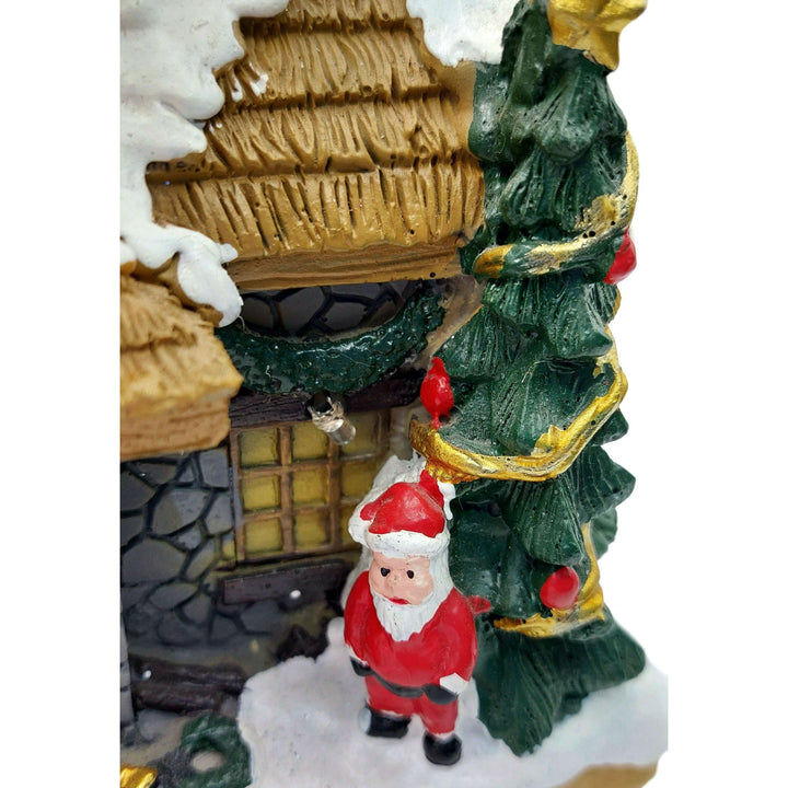 Festive Cottage with Santa Claus. Christmas Village Wizardi F07-N1-11-601