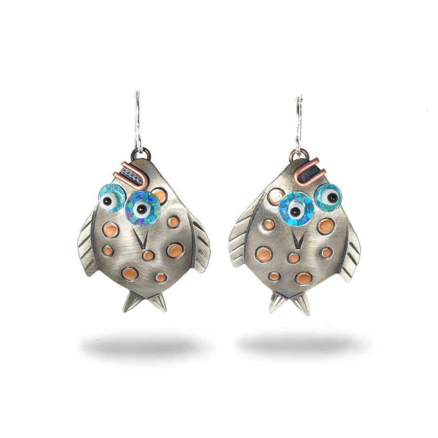 Chickenscratch Flounder Earrings — handmade nickel silver fish earrings with copper mouths, copper-painted details, and blue prismatic eyes, sterling silver ear wires