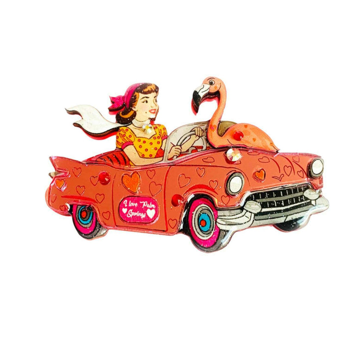 Vintage-style illustration of a woman in a car with a flamingo brooch