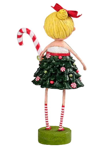 Decorative figurine of a girl in a Christmas tree dress holding a candy cane on a gray background