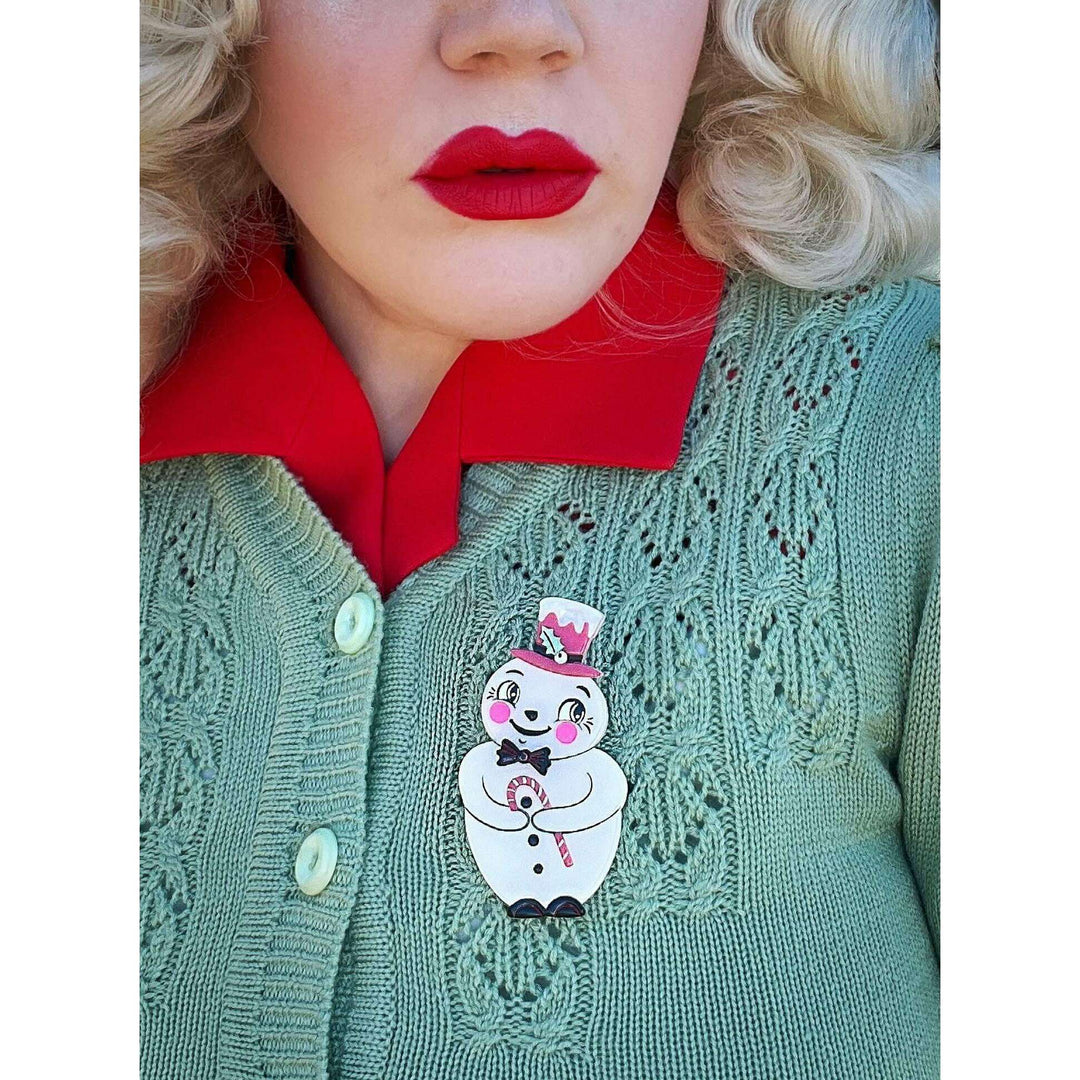 Johanna Parker x Lipstick & Chrome snowman brooch styled on coat — Love at Frost Sight
