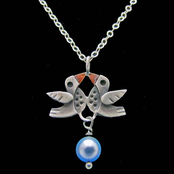 Chickenscratch Lovebirds Necklace detail — artisan sterling silver double bird pendant with pearl dangle handmade in USA