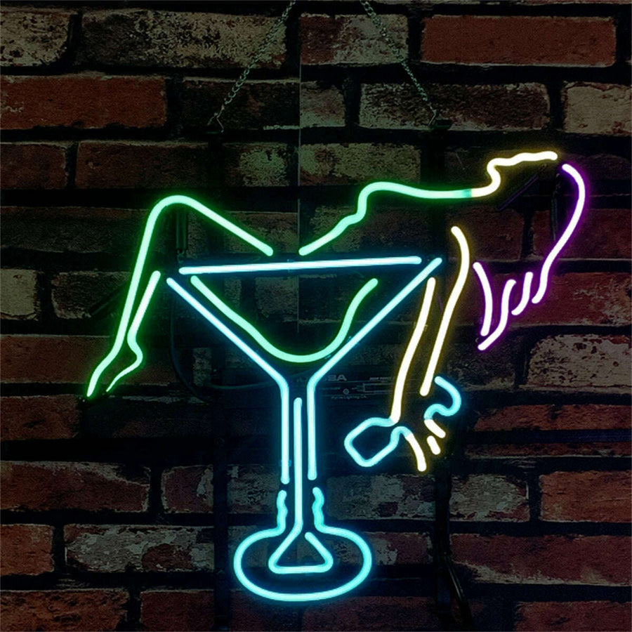 Neon sign of a cocktail glass with a woman's silhouette 