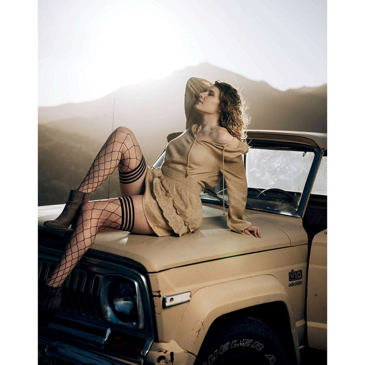 Michelle: Here's a netting they won't soon be forgetting. Petite to Plus Size Thigh Highs