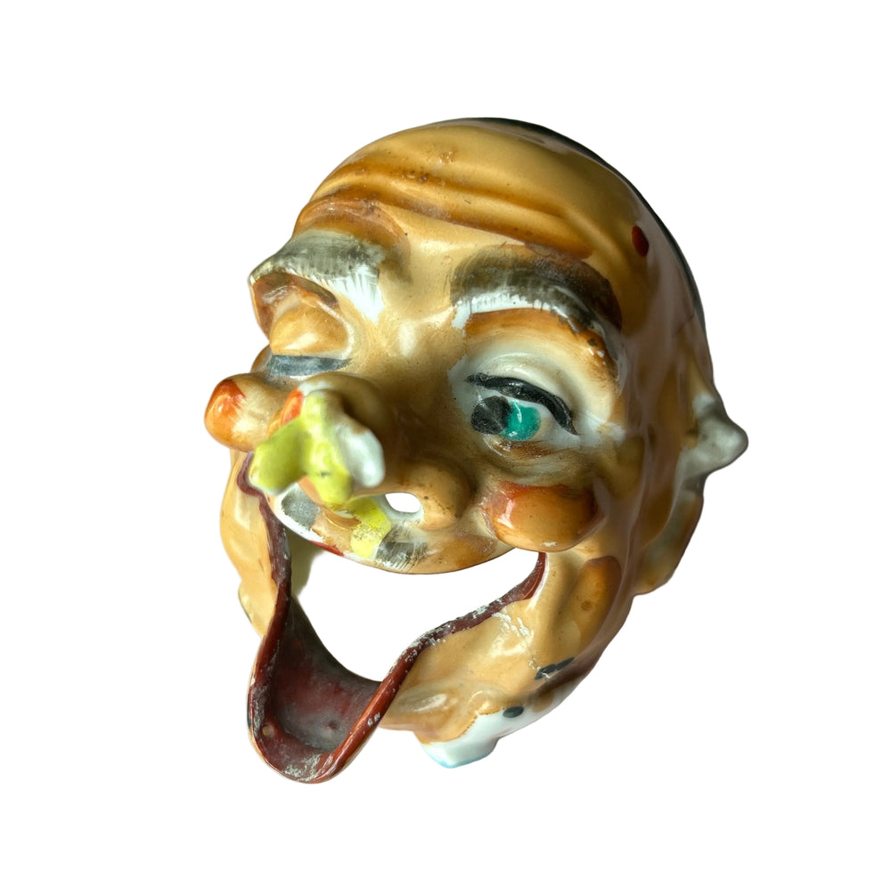 Old man ashtray angle view