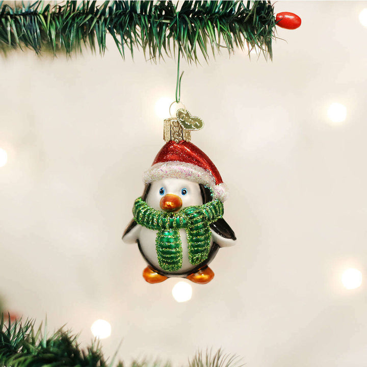 Old World Christmas Playful Penguin Blown Glass Ornament