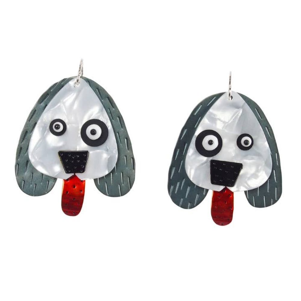 Chickenscratch Pooch Dog Earrings — handmade white guitar pick dog earrings with blackened swinging ears, red enamel tongue, and mismatched eyes, sterling silver ear wires