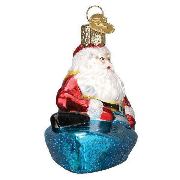 Old World Christmas Santa in Kayak Blown Glass Ornament