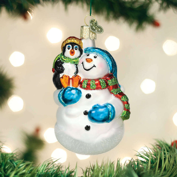 Old World Christmas Snowman with Penguin Pal Blown Glass Ornament
