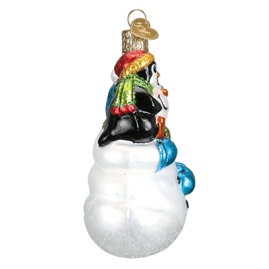 Old World Christmas Snowman with Penguin Pal Blown Glass Ornament