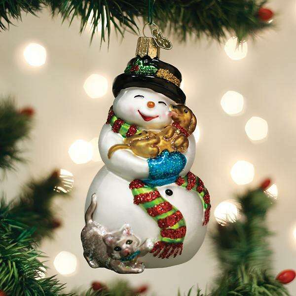 Old World Christmas Snowman With Playful Pets Blown Glass Ornament