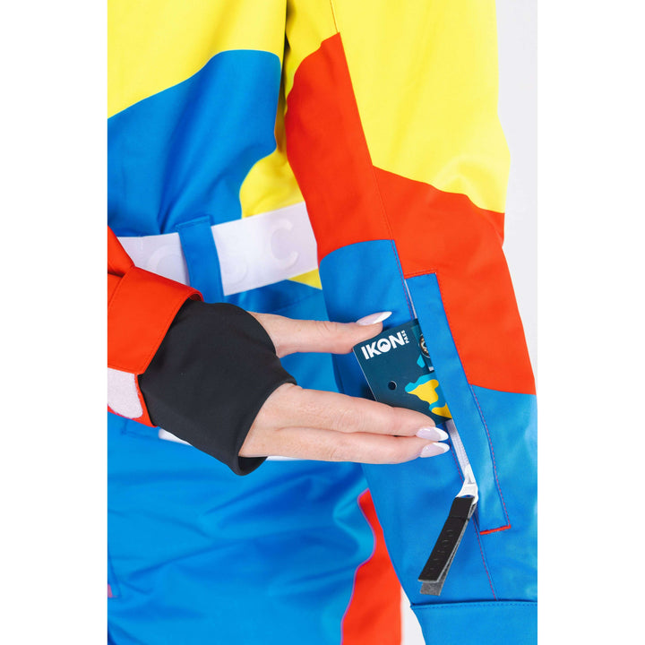 The Groovy Gondola | Orange Retro Swirl Women's One Piece Ski Suit