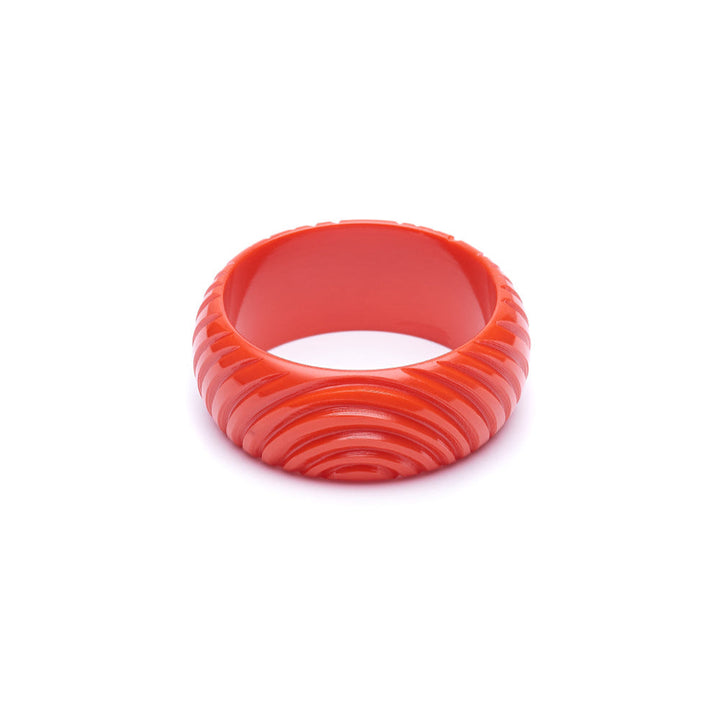 Wide Papaya Heavy Carve Fakelite Bangle by Splendette 