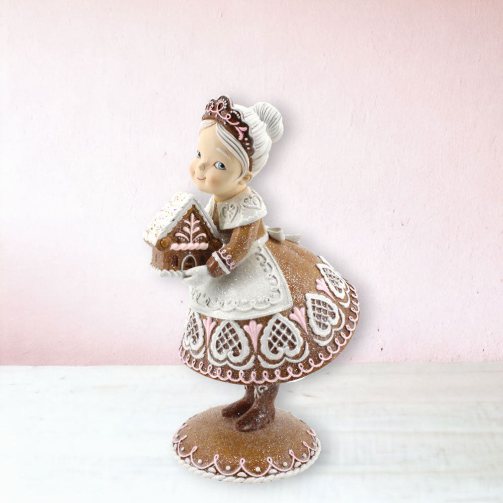 Gingerbread Mrs Claus Holding Gingerbread House by December Diamonds