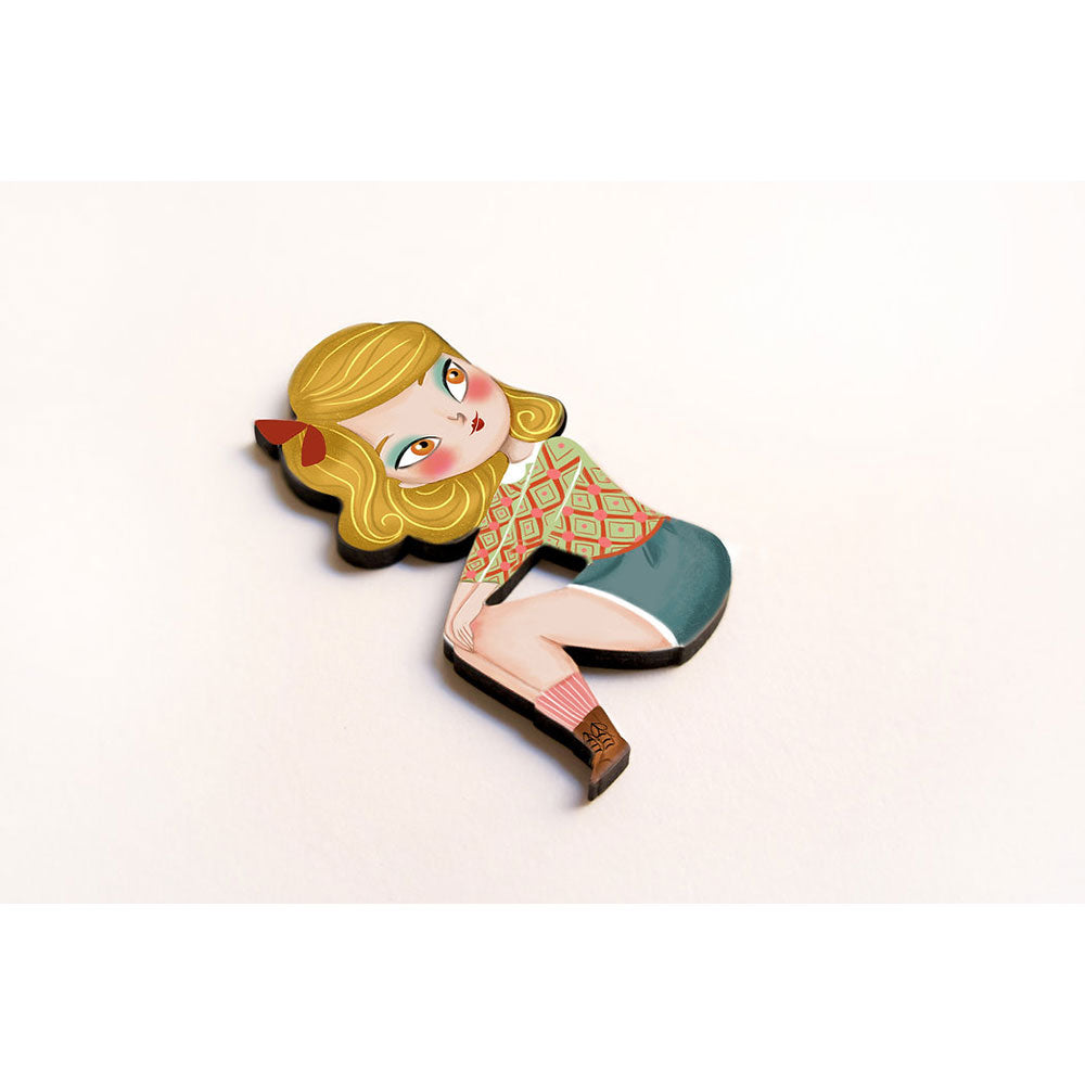 Puzzle with blonde girl brooch
