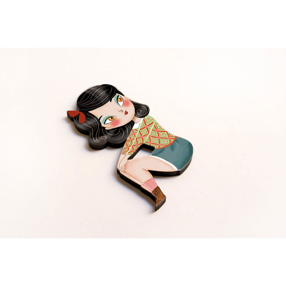 Puzzle with brunette girl brooch